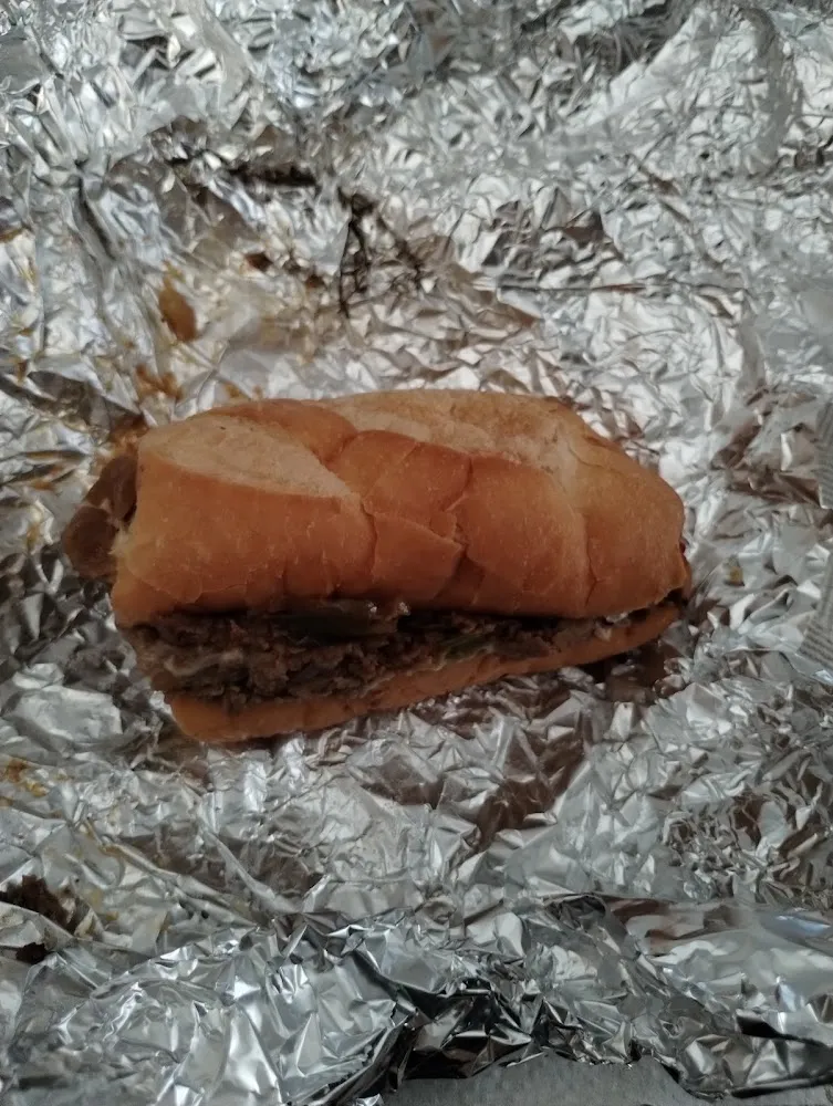 Half of a 15oz Cheesesteak Sandwich